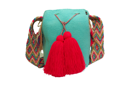 Turquoise Wayuu Bag with Gem Handel, the crochet bag also ahs 2 tassels