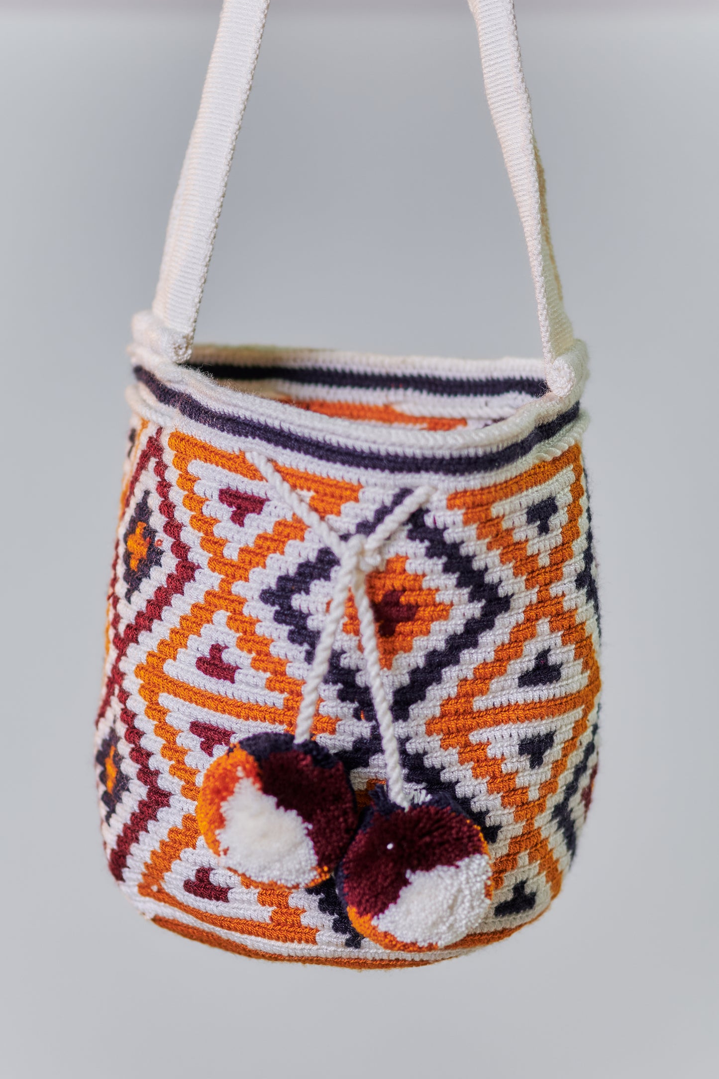 Medium Patterned Crochet Bag with Pom Poms