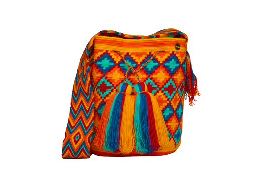 Orange Patterned Crochet Bag, the handbag also has 2 tassels.